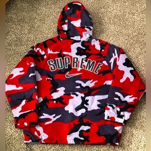 Supreme Nike corduroy full zip hooded jacket. Red camo. Size Lg.  W/ StockX tag